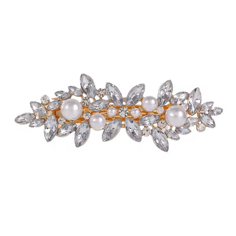 Broche con perlas