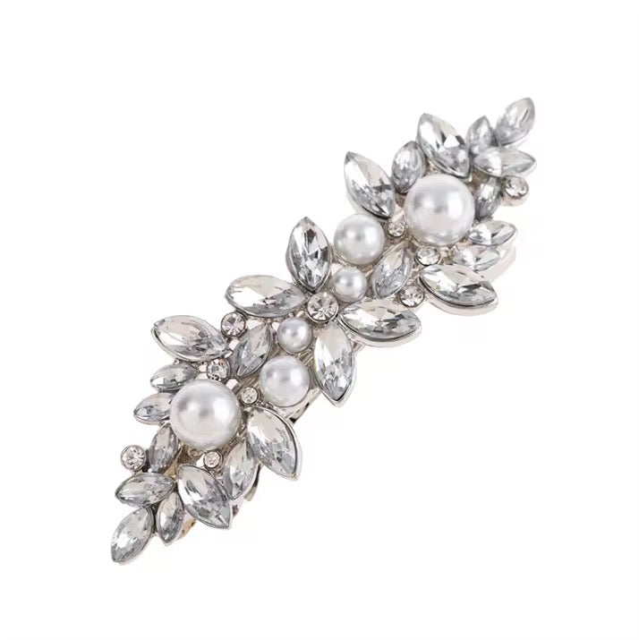 Broche con perlas